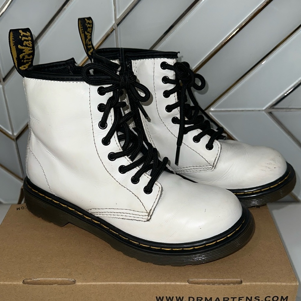 White DR  MARTENS big kids size 2. Some scruffs on the front pls see pictures